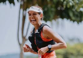 Nat smiling while running during her 1000km solo run